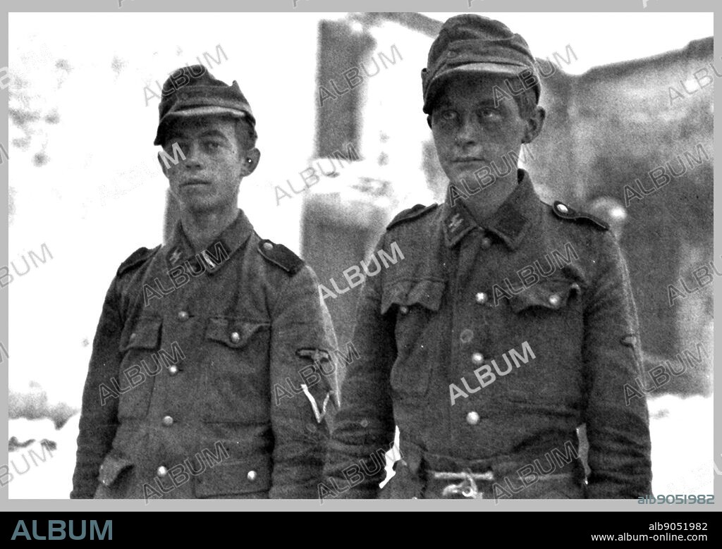 Captured soldiers from the 12th SS Panzer Division of the Hitlerjugend (Hitler Youth). This division was a German Waffen-SS armoured division during World War II. It was unique because the majority of the men fighting in it were drawn from the Hitler Youth while the senior officers tended to be veterans of the Eastern Front.