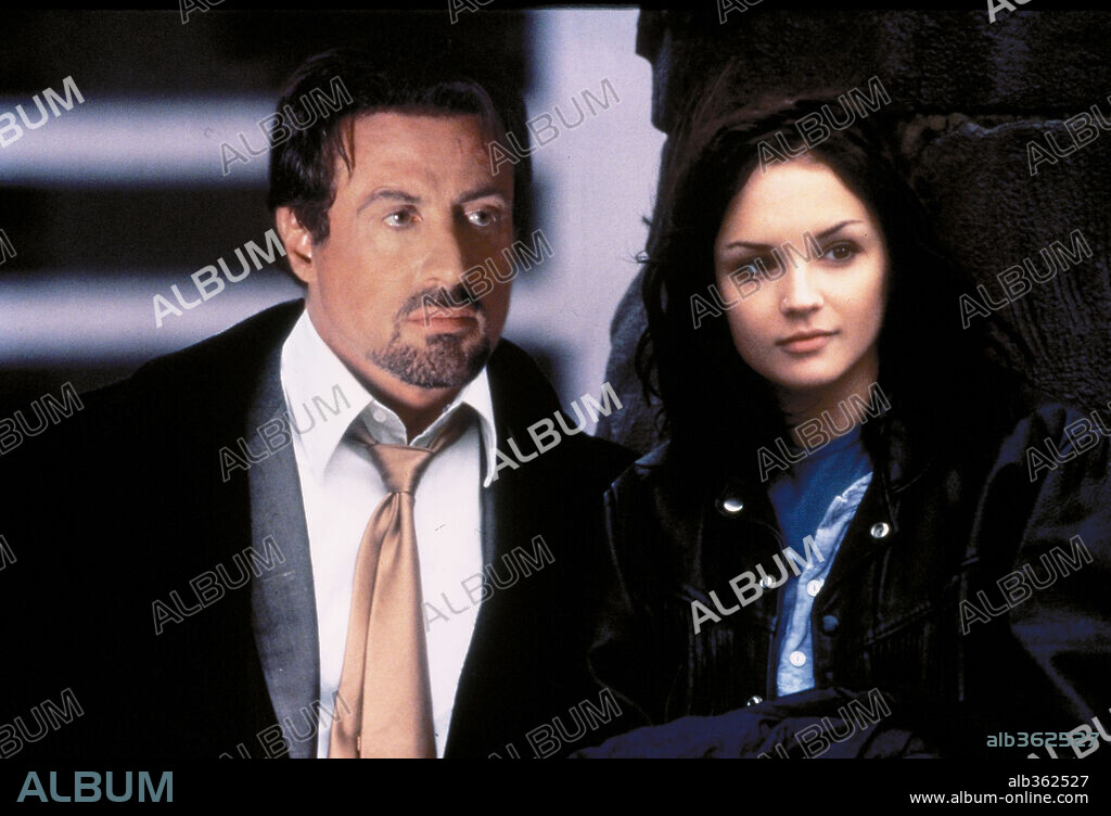 LEIGH RACHAEL COOK and SYLVESTER STALLONE. RACHAEL LEIGH COOK and SYLVESTER STALLONE in GET CARTER, 2000, directed by STEPHEN T. KAY. Copyright MORGAN CREEK.