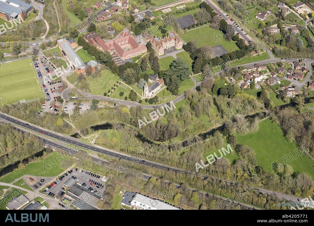 Park and garden at Shaw House, Newbury, West Berkshire, 2018. Aerial view showing St Mary's Church, Trinity School and the River Lambourne.