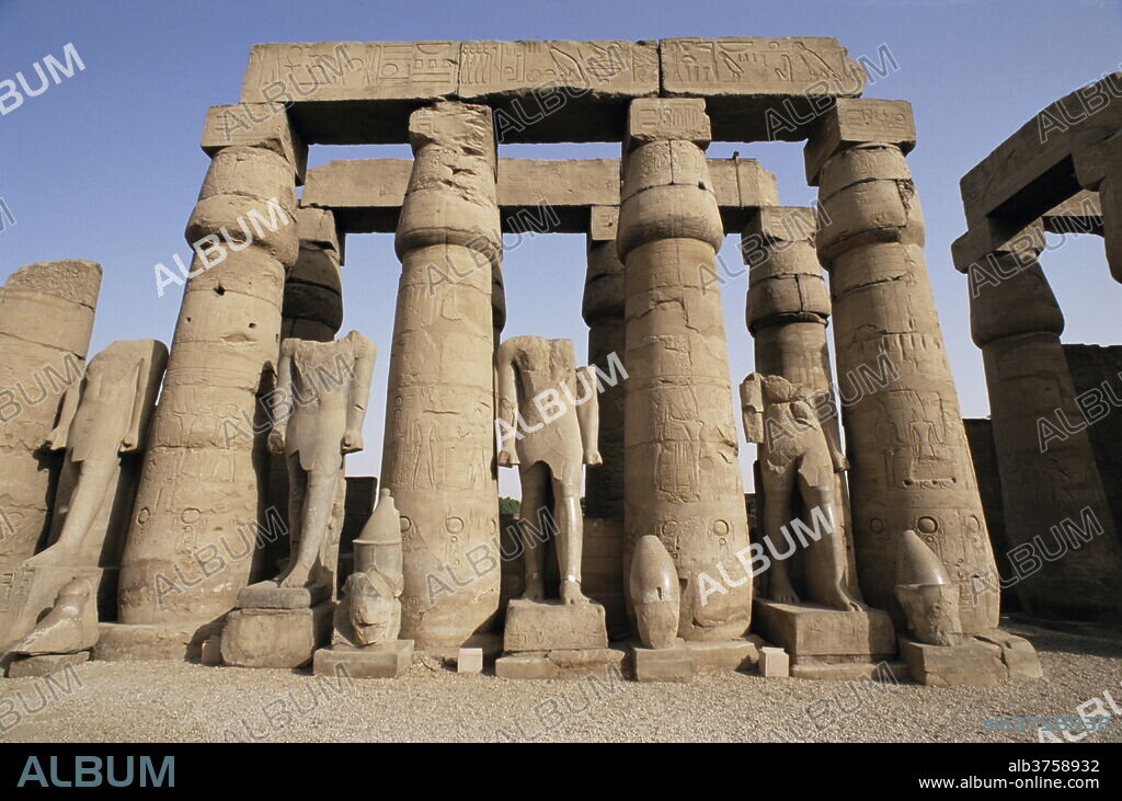 Osiris statues and Colonnade, Luxor Temple, Thebes, UNESCO World Heritage Site, Egypt, North Africa, Africa.