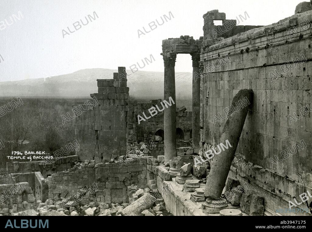Temple of Bacchus, Baalbek, Lebanon, c1920s-c1930s(?). Baalbek is the site of the ancient city of Heliopolis, which rose to prominence during the later Hellenistic and Roman period. The main temple complex had sanctuaries devoted to Jupiter (Baal), Venus (Aphrodite), and Bacchus, with a further temple to Mercury (Hermes) nearby. The Temple of Bacchus was built in the mid 2nd century aD during the reign of the Emperor Antoninus Pius.