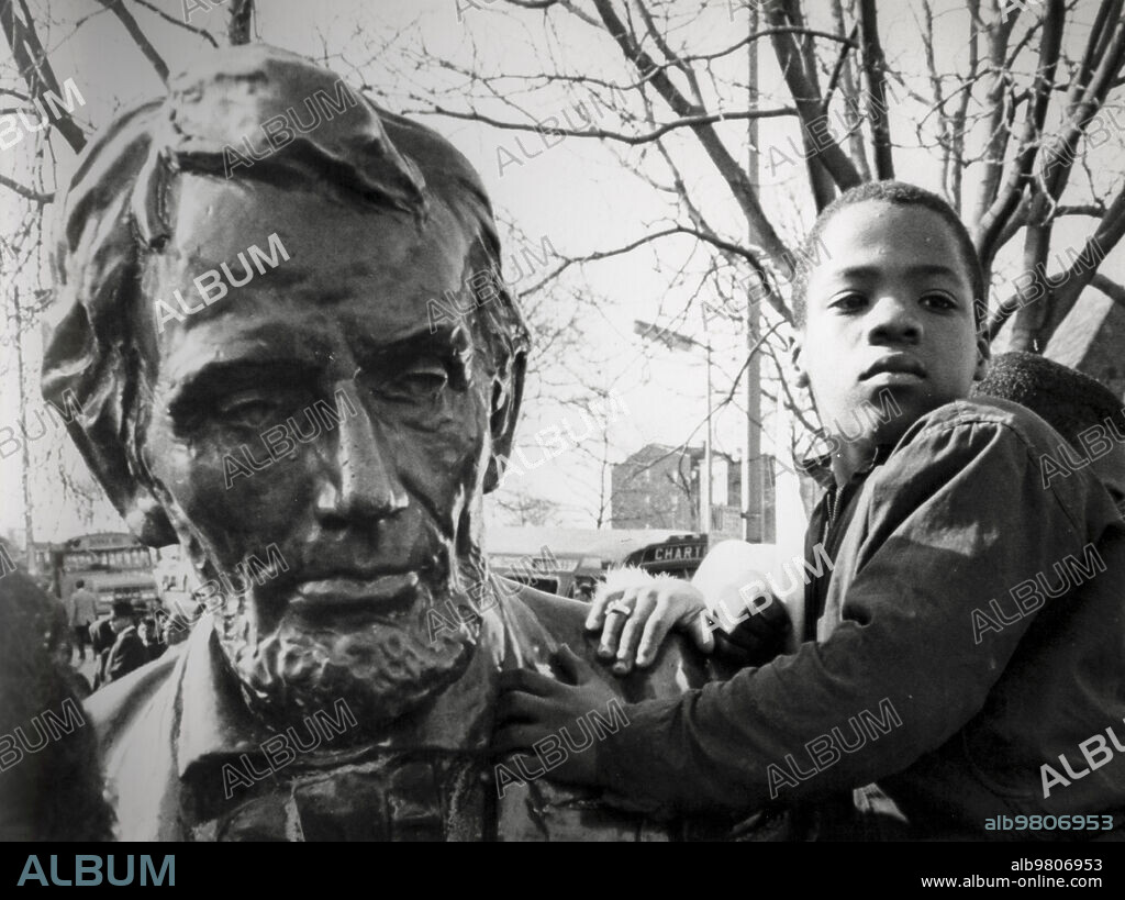 Newark riots, child near a lincoln's statue, 1968.