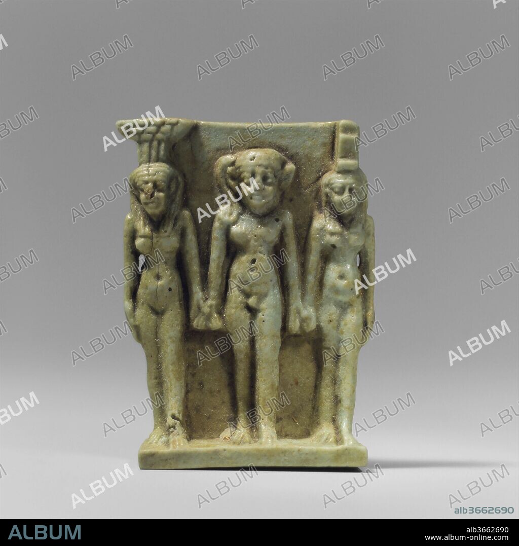 Nephthys, Horus, and Isis Amulet. Dimensions: H. 4.0 cm (1 9/16 in). Dynasty: Dynasty 26. Date: 664-525 B.C..
These three deities make up the Osirian triad from the great myth in Egyptian funerary religion. Horus, the young boy in the center, was the son of Osiris. His uncle Seth tried to kill him in order to become king of the gods, but Horus was saved by the magical skill and cunning of his mother, Isis. Nepthysis, Horus' aunt, aided her sister in his escape. Because both goddesses were magicians, they were excellent protectors of the vulnerable mummy. Small faience triads, such as this one, were generally placed on the lower torso of the deceased.