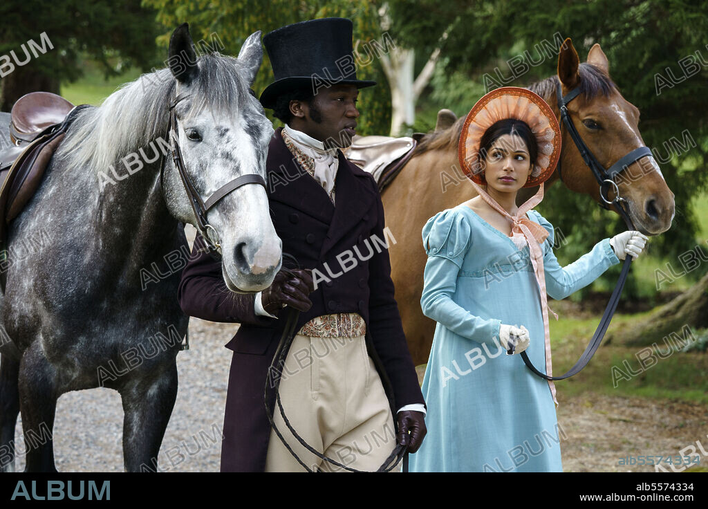 FREIDA PINTO and SOPE DIRISU in MR. MALCOLM'S LIST, 2022, directed by EMMA HOLLY JONES. Copyright UNIVERSAL PICTURES.