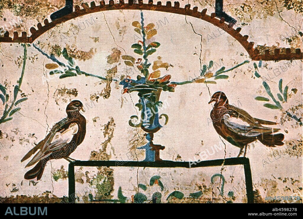 Decoration in the Catacombs of Praetextatus on the Via Appia, Rome, Italy, (1928). 'Beginning of 3rd Century A.D...detail, pigeons with cantharus, of an arcaded fresco in the "High Chamber of the spelunca magna".' After Joseph Wilpert. Plate XLV, fig 102, from "An Encyclopaedia of Colour Decoration from the Earliest Times to the Middle of the XIXth Century" with explanatory text by Helmuth Bossert. [Ernst Wasmuth Ltd., Berlin, 1928].