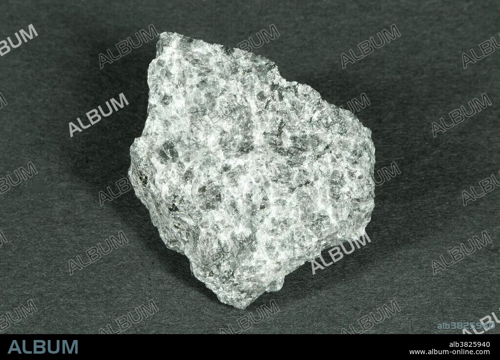 Hand sample of Anorthosite, a plutonic, or intrusive, igneous rock consisting almost entirely of feldspars with minor amounts of quartz. It usually displays a phaneritic texture; mineral grains are of nearly equal size and are visible to the naked eye.