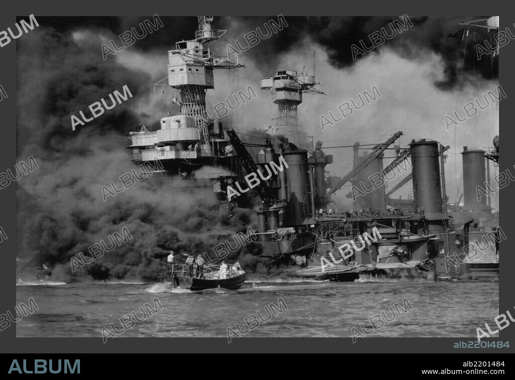 On December 7, 1941 the Japanese attacked Pearl Habor in Hawaii.  In one attack they sunk almost the entire Pacific Fleet.  This photograph shows the USS West Virginia on fire and the upper part of the USS Tenessee, already under the water.