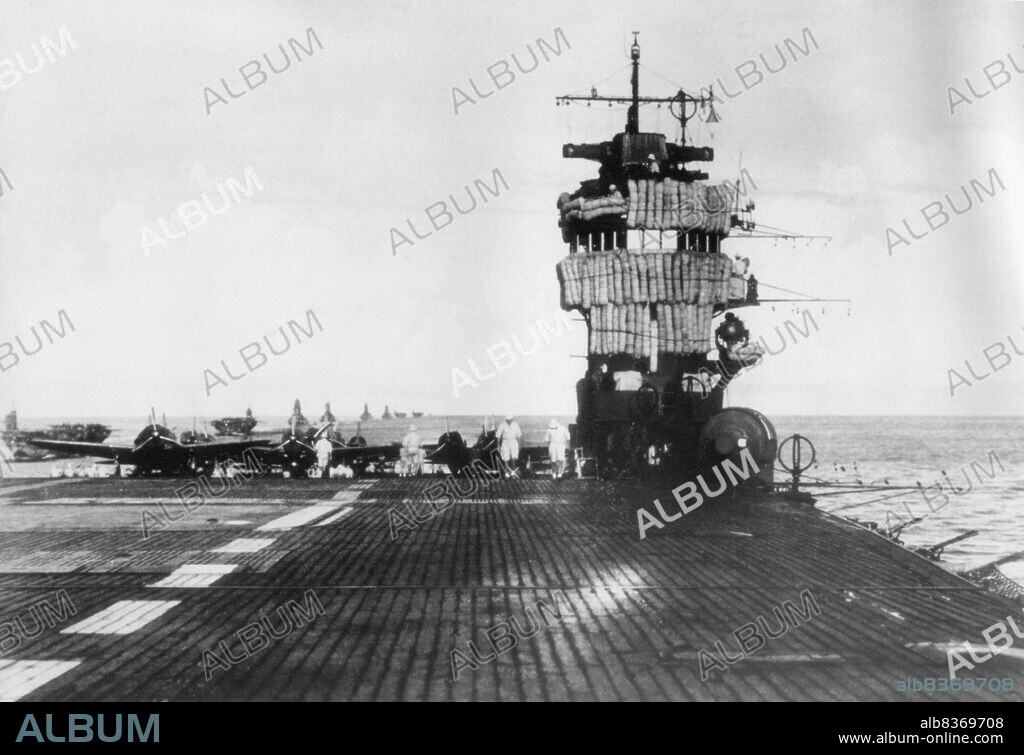 Akagi was an aircraft carrier built for the Imperial Japanese Navy (IJN), named after Mount Akagi in present-day Gunma Prefecture. Though she was laid down as an Amagi-class battlecruiser, Akagi was converted to an aircraft carrier while still under construction to comply with the terms of the Washington Naval Treaty. The ship was rebuilt from 1935 to 1938 with her original three flight decks consolidated into a single enlarged flight deck and an island superstructure.<br/><br/>. Akagi's aircraft served in the Second Sino-Japanese War in the late 1930s. Upon the formation of the First Air Fleet or Kido Butai (Striking Force) in early 1941, she became its flagship, and remained so for the duration of her service. With other fleet carriers, she took part in the Attack on Pearl Harbor in December 1941 and the invasion of Rabaul in the Southwest Pacific in January 1942. The following month, her aircraft bombed Darwin, Australia, and assisted in the conquest of the Dutch East Indies. In March and April 1942, Akagi's aircraft helped sink a British heavy cruiser and an Australian destroyer in the Indian Ocean Raid.<br/><br/>. After a brief refit, Akagi and three other fleet carriers of the Kido Butai participated in the Battle of Midway in June 1942. After bombarding American forces on the atoll, Akagi and the other carriers were attacked by aircraft from Midway and the carriers Enterprise, Hornet, and Yorktown. Dive bombers from Enterprise severely damaged Akagi. When it became obvious she could not be saved, she was scuttled by Japanese destroyers to prevent her from falling into enemy hands. The loss of Akagi and three other IJN carriers at Midway was a crucial strategic defeat for Japan and contributed significantly to the Allies' ultimate victory in the Pacific.