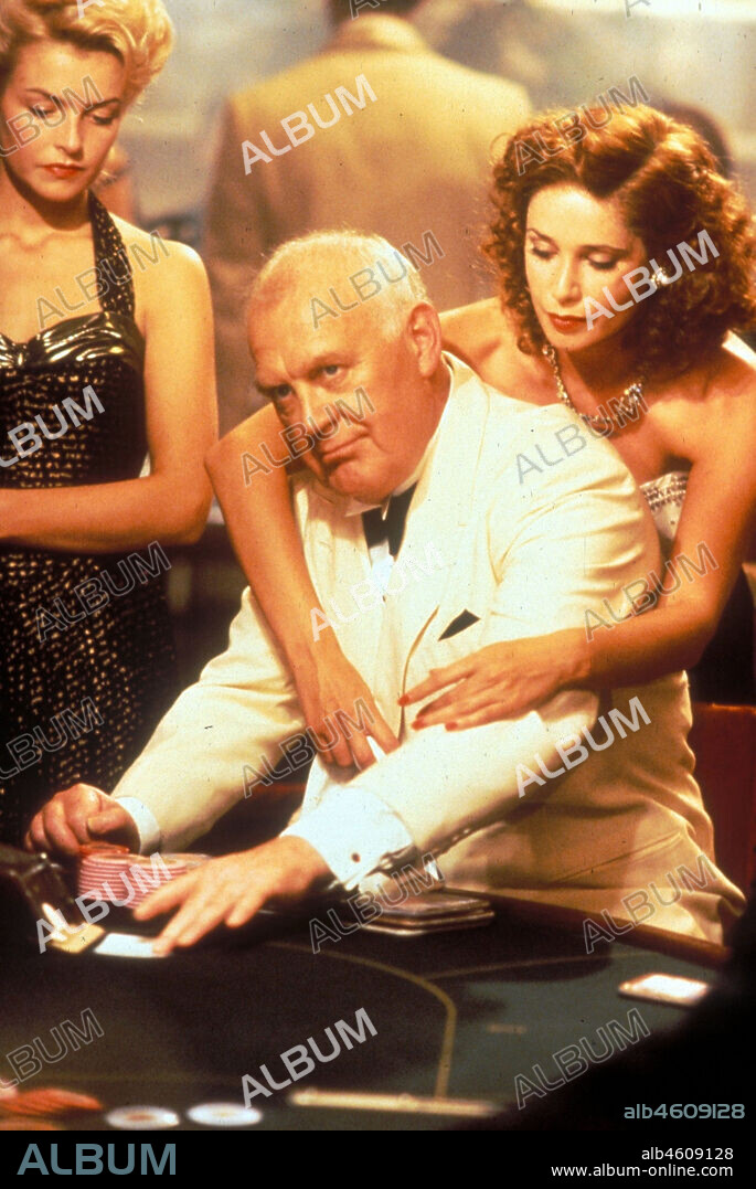 JOSS ACKLAND and KRISTIN SCOTT THOMAS in THE SECRET LIFE OF IAN FLEMING, 1990 (SPYMAKER: THE SPYMAKER: SECRET LIFE OF IAN FLEMING), directed by FERDINAND FAIRFAX. Copyright Saban/Scherick Productions / Cortesía.