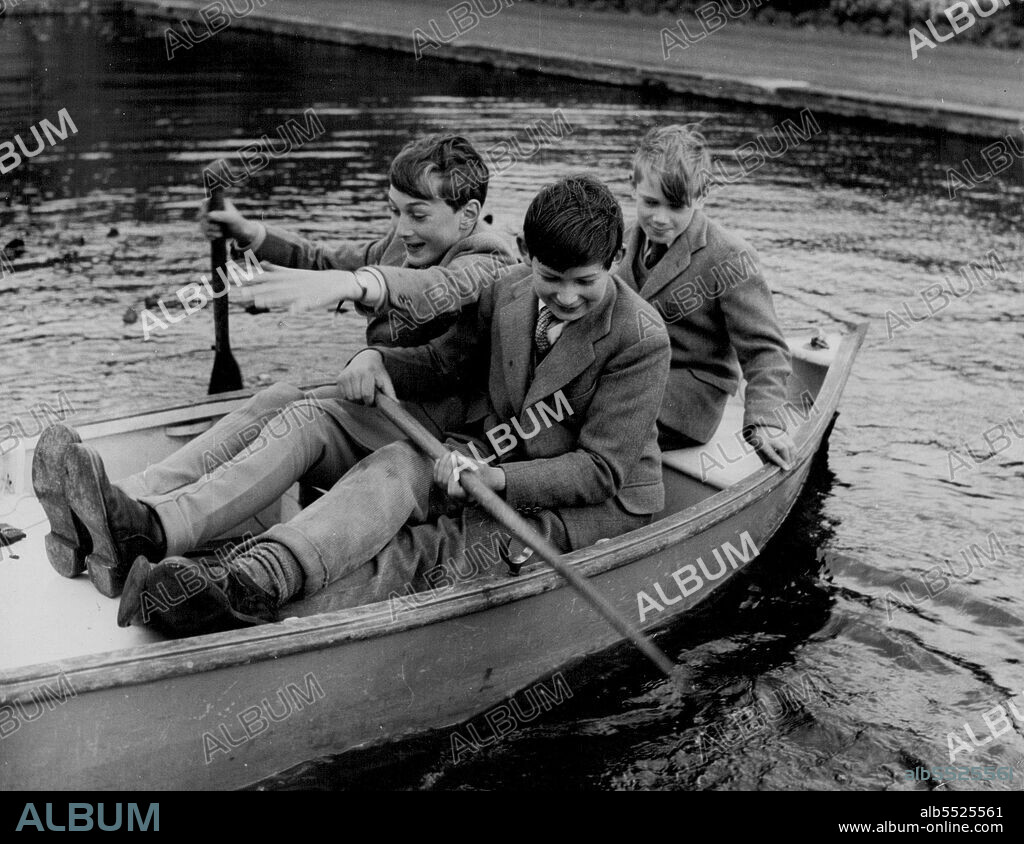 The Gloucesters At Home at Barnwell Manor - Three Princes in a Boat on the ornamental lake at Barnwell Manor. The oarsmen are Prince William, 12½(left), and Prince Michael of Kent, 12; Prince Richard, age 9¾, is in charge of the steering. March 2, 1955. (Photo by Tom Blau, Camera Press).