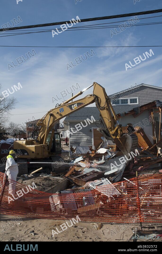 Hurricane Sandy Aftermath. Demolition of damaged house. Breezy Pt. Queens, NY.