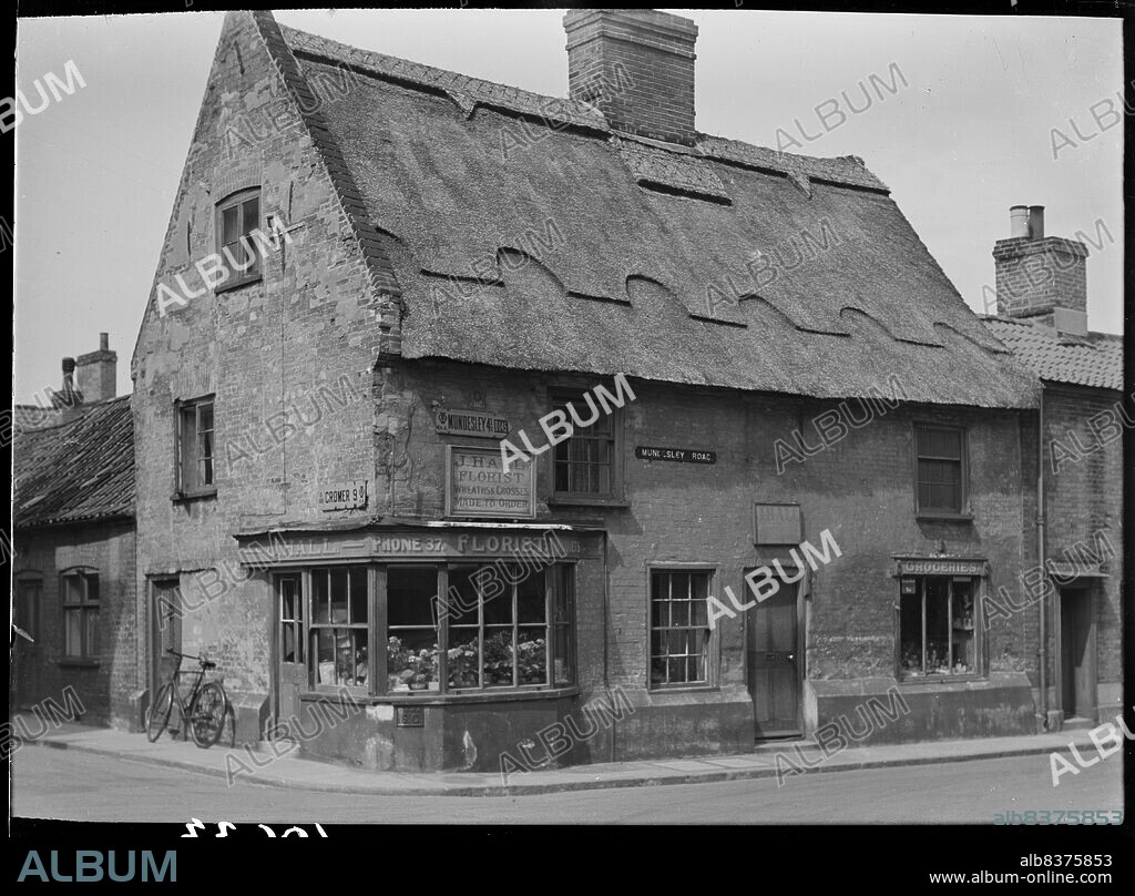 HERBERT FELTON. J Hall Florist's Shop, Mundesley Road, North Walsham, North Norfolk, Norfolk, 1947. Exterior view from the south-east of 1 Mundesley Road, a florist shop occupied by J Hall.