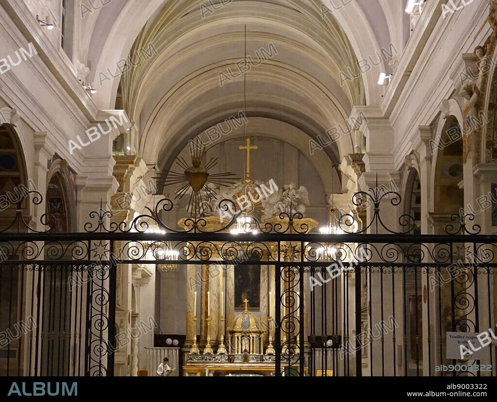 Interior of the church of the Santissima Trinita dei Monti. a Roman Catholic late Renaissance titular church in Rome, central Italy. It is best known for its commanding position above the Spanish Steps which lead down to the Piazza di Spagna. The church and its surrounding area (including the Villa Medici) are the responsibility of the French State.