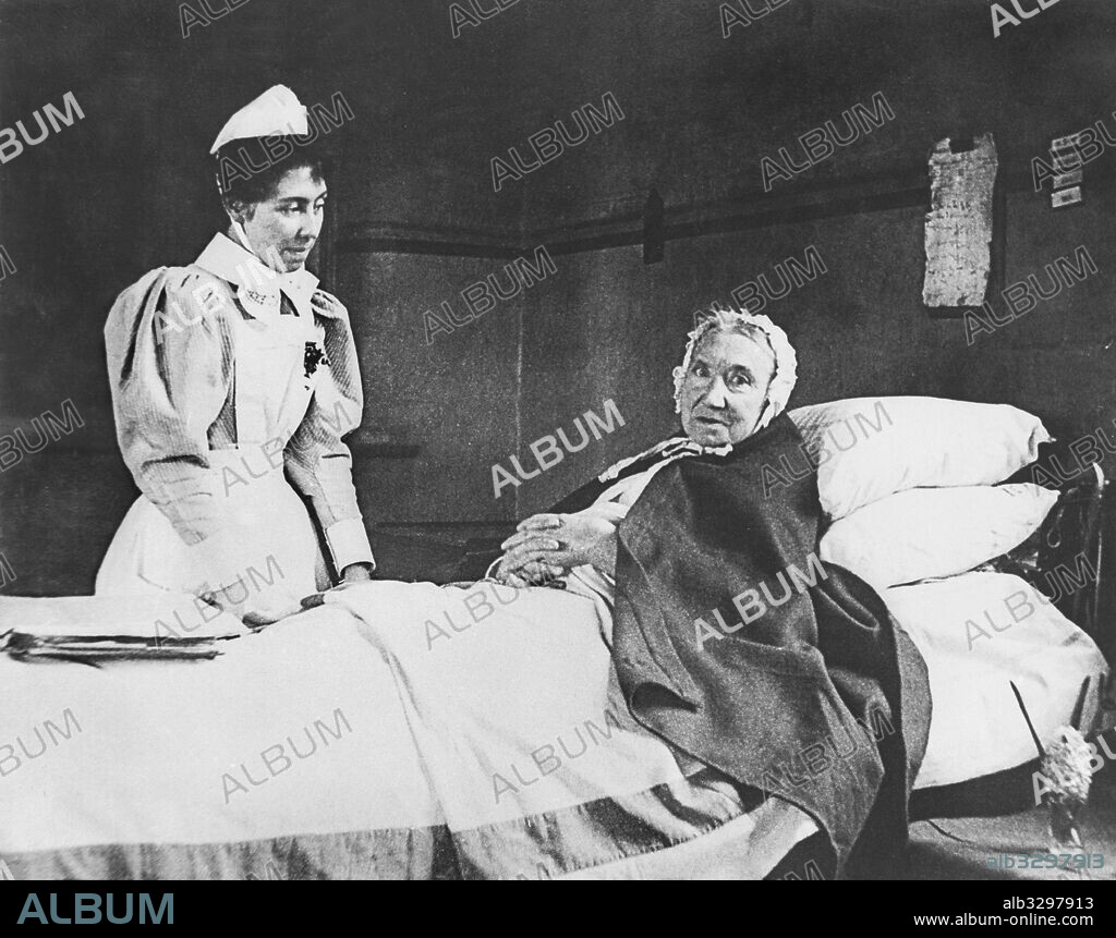 An Old Lady in Bed Being Attended by a Nurse in Crumpsall Workhouse, Manchester - c1890.