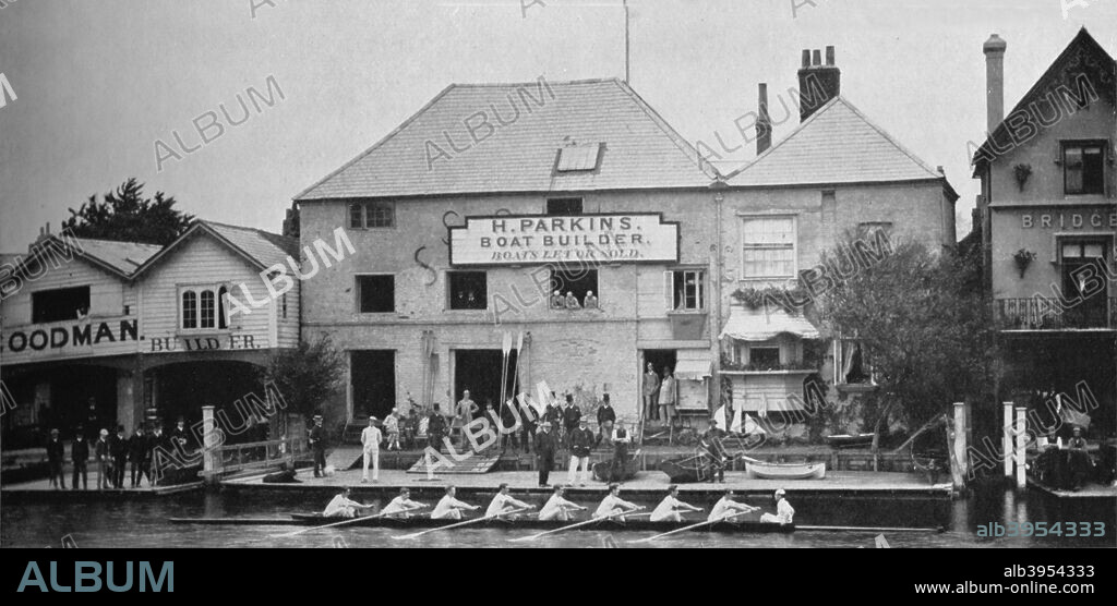 'The Boathouse Before Reconstruction, 1882', 1935. Eton College Boat House (formerly Brocas Boat House Company) before the renovation of the old building, dated back to 1882. From The Eton Book of the River - With Some Account of the Thames and the Evolution Boat-Racing, by L.S.R. Byrne and E. L. Churchill. [Spottiswoode, Ballantyne & Co. Ltd, Eton, 1935].