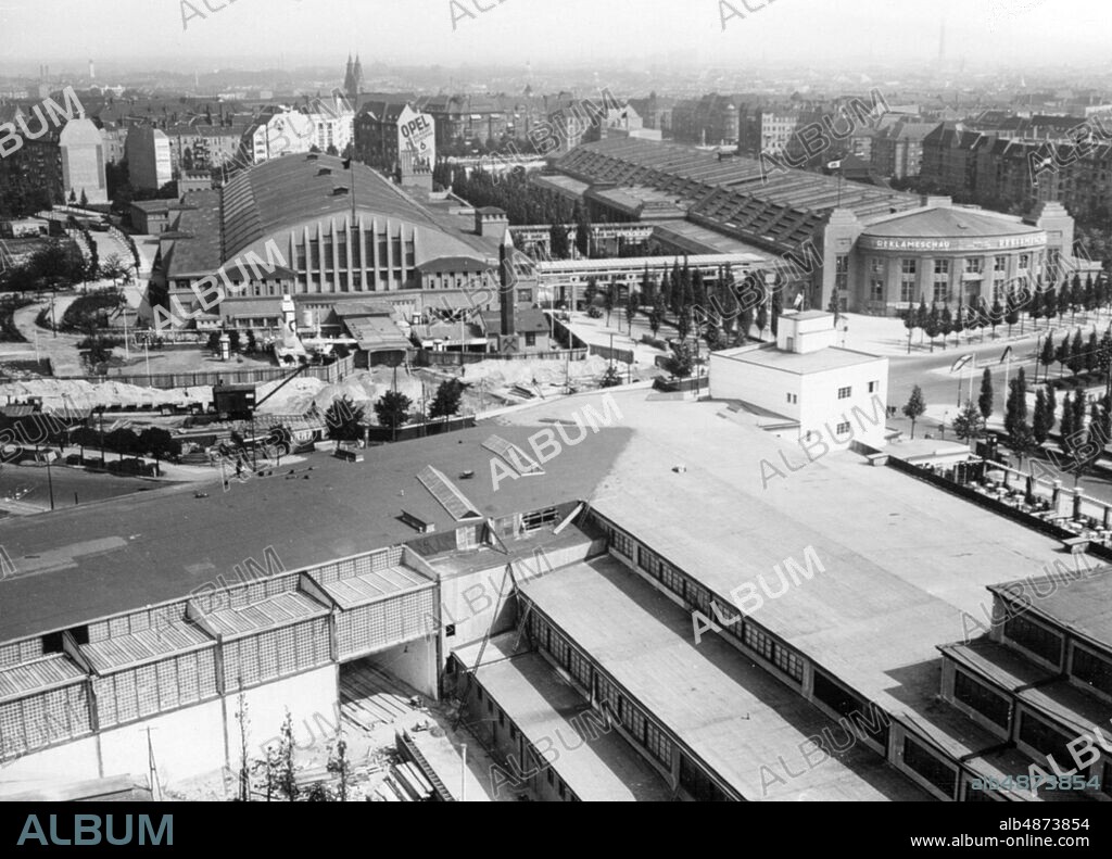 GERMANY BERLIN 1929-08. Orig. caption ... BERLIN'S MASS FOURTH AT KAISERDAMM. 30307) View from a function tower on the two exhibition halls, in which the large advertising exhibition is now housed. In the foreground a part of the radio hall. Photo: AB Text & Bilder / SVT / Code: 5600 Folder: Advertising exhibitions 5509 Exhibitions Exterior International advertising congress and exhibition in Berlin 11-15 August 1929 sites: GERMANY; BERLIN PhotoDate: 1929-08- ??.