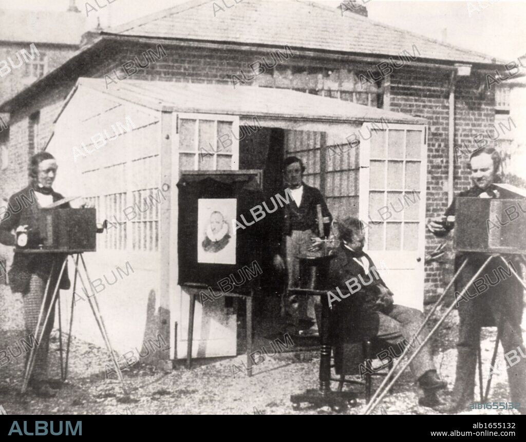 Fox Talbot, right, outside his photographic studio c1848. William Henry Fox Talbot (1800-1877) of Lacock Abbey, Wiltshire. English mathematician, physicist and pioneer in the field of photography. In 1841 he patented the calotype process which produced a negative from which multiple copies could be made.  (Photo by: Universal History Archive/UIG via Getty Images).