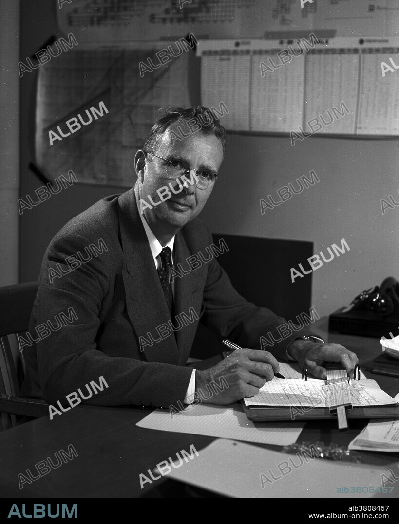 Alvarez at his desk taken August 11, 1954. Luis Walter Alvarez (June 13, 1911 - September 1, 1988) was an American experimental physicist, inventor, and professor. In 1936, he went to work for Ernest Lawrence at the Radiation Laboratory at the University of California, where he devised a set of experiments to observe K-electron capture in radioactive nuclei, predicted by the beta decay theory but never observed. In 1940 he joined the MIT Radiation Laboratory, where he contributed to a number of WWII radar projects. He spent a few months at the University of Chicago working on nuclear reactors for Fermi before coming to Los Alamos to work for Oppenheimer on the Manhattan project. After the war Alvarez was involved in the design of a liquid hydrogen bubble chamber that allowed his team to take millions of photographs of particle interactions, develop complex computer systems to measure and analyze these interactions, and discover entire families of new particles and resonance states. This work resulted in his being awarded the Nobel Prize in 1968. With his son, geologist Walter Alvarez, he developed the Alvarez hypothesis which proposes that the extinction event that wiped out the dinosaurs was the result of an asteroid impact. He died of cancer in 1988 at the age of 77.
