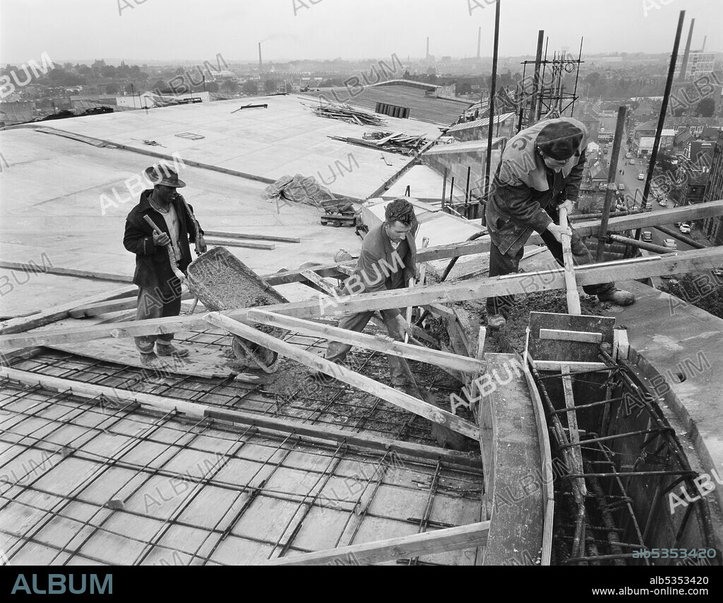 JOHN LAING PLC. A team of Laing builders concreting part of the roof of Coventry Cathedral during its construction. This image was catalogued as part of the Breaking New Ground Project in partnership with the John Laing Charitable Trust in 2019-20.