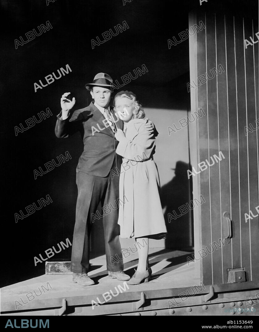 JOHN GARFIELD and PRISCILLA LANE in DUST BE MY DESTINY, 1939, directed by LEWIS SEILER. Copyright WARNER BROTHERS.