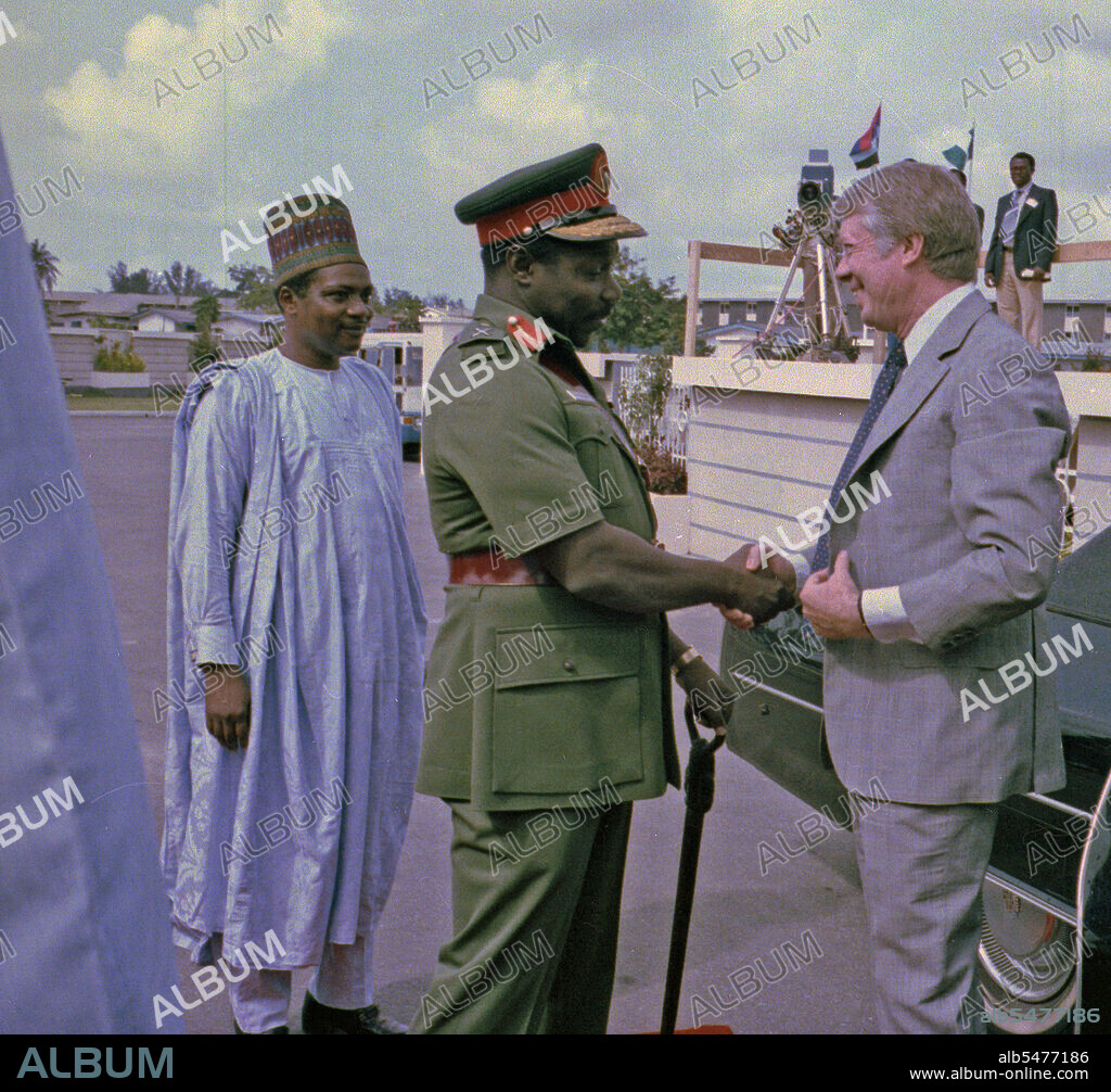 Lt. General Olusegun Obasanjo welcomes Jimmy Carter to Nigeria. circa  1 April 1978.