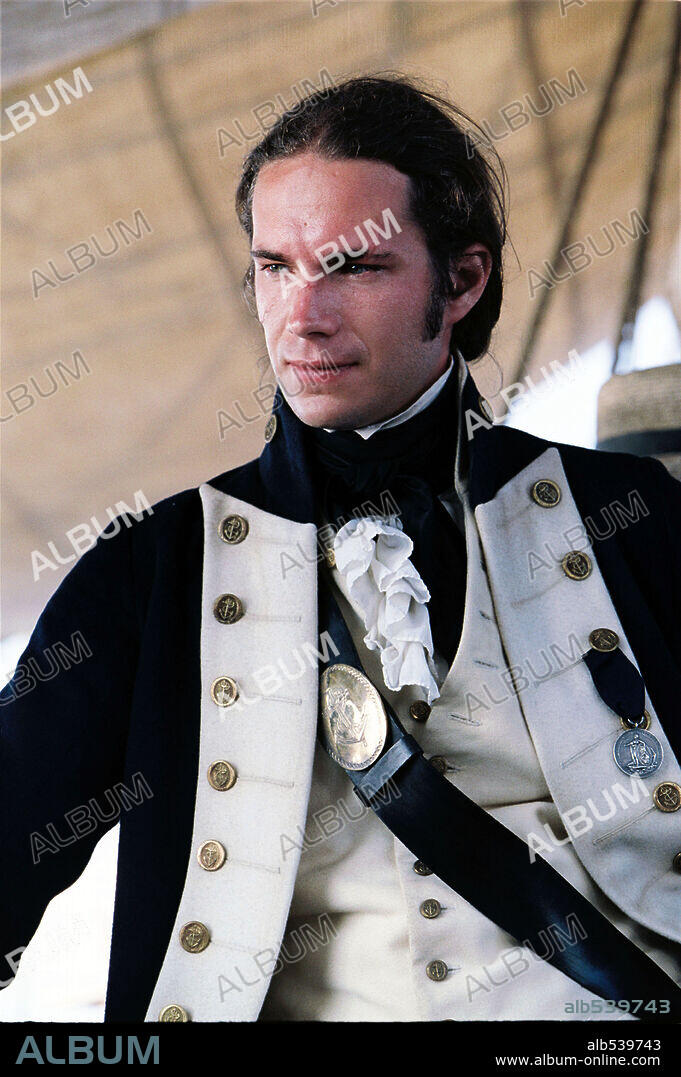 JAMES D'ARCY in MASTER AND COMMANDER: THE FAR SIDE OF THE WORLD, 2003, directed by PETER WEIR. Copyright 20TH CENTURY FOX/MIRAMAX/UNIVERSAL/SAMUEL GOLDWYN FILMS.