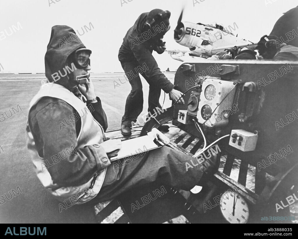 March 1967 - A catapult officer at his station during flight operations aboard the USS Bonhomme Richard (CVA-31) in the South China Sea.