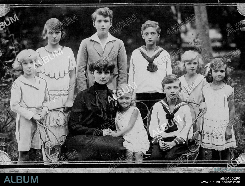 Happy Children of A Tragic Empress -- An interesting picture just received from the Villa Lequeitio, Spain, showing the ex-Empress Zita with her family. The standing figures are: The Archduke Karl-Ludwig, Archduchess Adelaide, the Archduke Otto, Robert and Rudolf, and the Archduchess Charlotte. Seated are: the ex-Empress Zita, the Archduchess Elizabeth-Charlotte and the Archduke Felix. October 01, 1940. (Photo by Central News).