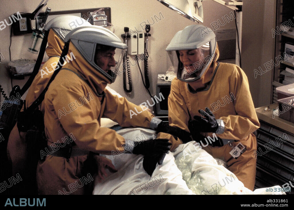 DUSTIN HOFFMAN und RENE RUSSO in OUTBREAK, 1995, unter der Regie von WOLFGANG PETERSEN. Copyright WARNER BROTHERS / SOREL, PETER.
