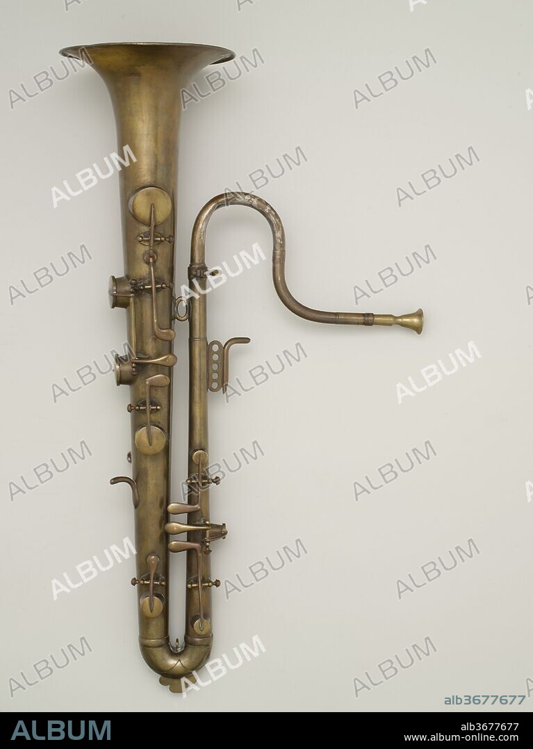 Soprano ophicleide in B-flat. Culture: French. Dimensions: 25 11/16 × 6 13/16 × 11 1/2 in. (65.2 × 17.3 × 29.2 cm). Maker: Adolphe (Antoine Joseph) Sax (Belgian, Dinant, Belgium 1814-1894 Paris). Date: mid-19th century.
The ophicleide is a low brass instument that was used in bands and orchestras during the nineteenth century. It was replaced by the tuba.
In seeking to create a loud, low woodwind instrument, Adolphe Sax experimented with placing a bass clarinet mouthpiece on an ophicleide. This idea spawned the first saxophone.