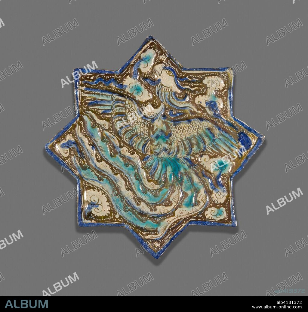 ISLAMIC. Star-Shaped Tile with Phoenix. Iran; possibly Takht-i Sulayman. Date: 1250-1290. Dimensions: 21.2 × 21.8 × 1.2 cm (8 5/16 × 8 9/16 × 1/2 in.). Fritware with molded decoration, in-glaze painting in blue and turquoise, and overglaze painting in luster. Origin: Iran.
