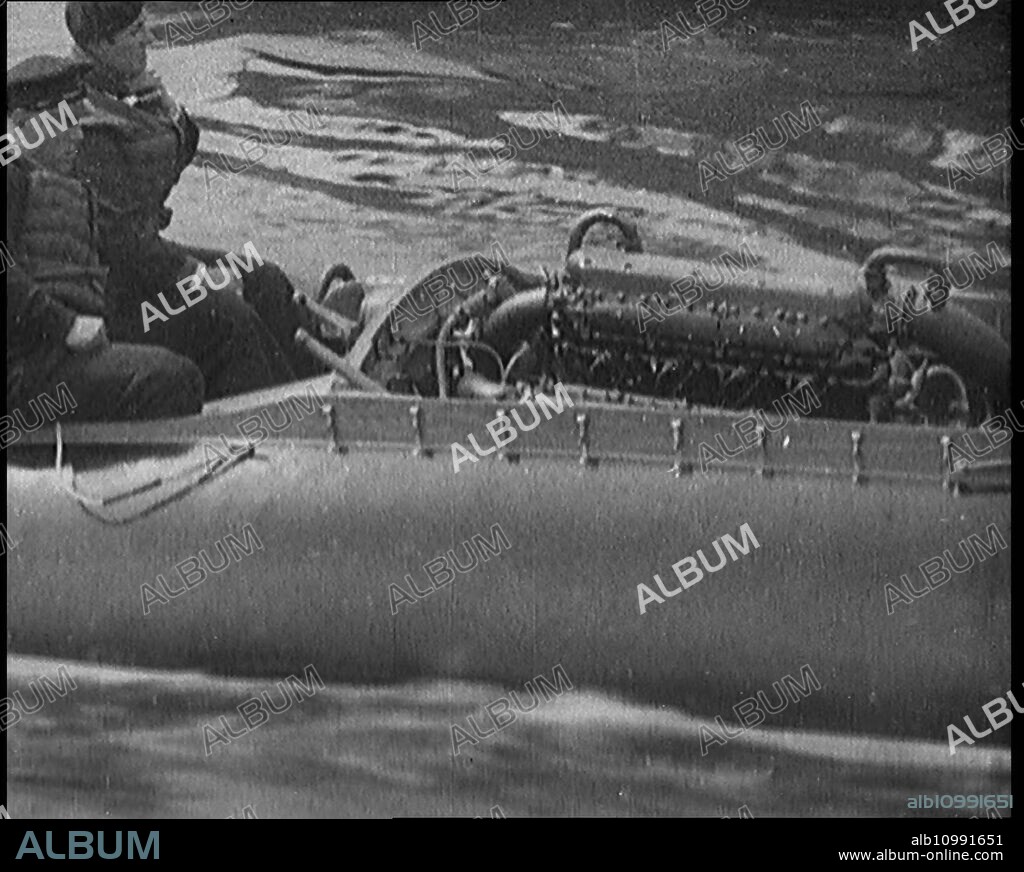 Marion Barbara 'Joe' Carstairs on a Speedboat with a Male Civilian Passenger, 1920s. From "Time to Remember - Teenage Flapper", 1920s (Reel 4); a dcumentary about women's lives in the 1920s - great commentary by Joyce Grenfell.