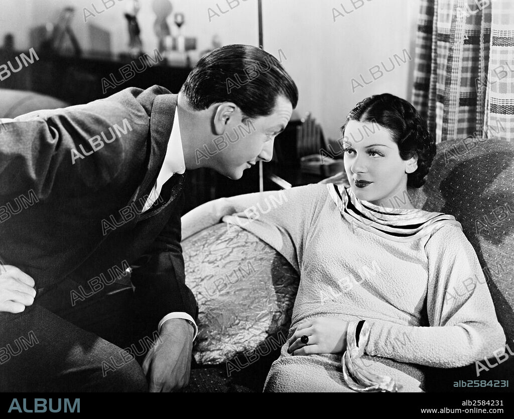 ROBERT YOUNG and ROSALIND RUSSELL in WEST POINT OF THE AIR, 1935, directed by RICHARD ROSSON. Copyright METRO GOLDWYN MAYER.
