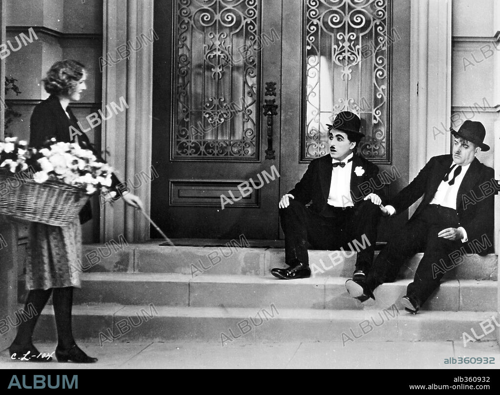 CHARLIE CHAPLIN, HARRY MYERS et VIRGINIA CHERRILL dans CITY LIGHTS, 1931, réalisé par CHARLES CHAPLIN. Copyright UNITED ARTISTS.