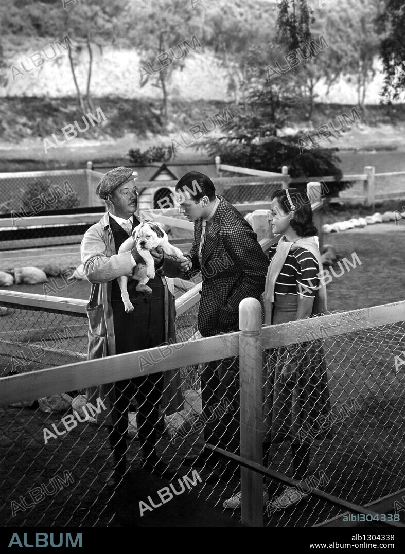 DOUGLAS FAIRBANKS JR. and PAULETTE GODDARD in THE YOUNG IN HEART, 1938, directed by RICHARD WALLACE. Copyright SELZNICK/UNITED ARTISTS.