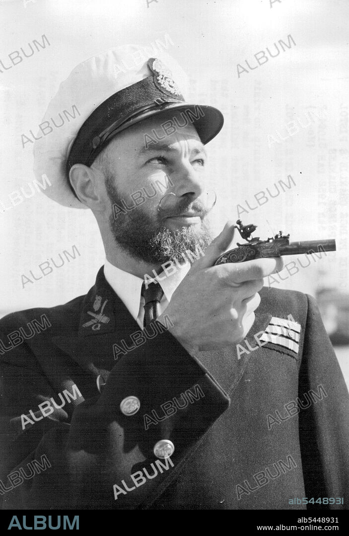 Bonnie Prince Charlie's Pistol For Prince Charles Chief Petty Officer Douglas Nannestad, of Browns Bay, Auckland, holding the pistol aboard the Bellona in Portsmouth Dockyard today (Saturday). First New Zealand warship to visit Britain since the war, the New Zealand Navy's cruiser Bellona, which has come to take part in the NATO Exercise 'Mainbrace,' entered Spithead this morning (Saturday) and tied up in Portsmouth Dockyard. The Ship's captain, Capt. G.V.M. Dolphin, brought with him an old flintlock pistol for presentation to Prince Charles. The gift of Mrs. Calbraith, of Auckland, New Zealand, it is believed to have been presented by Bonnis Prince Charles to Flora Macdonald when she helped him to escape from Scotland to France. September 06, 1952. (Photo by Reuterphoto).