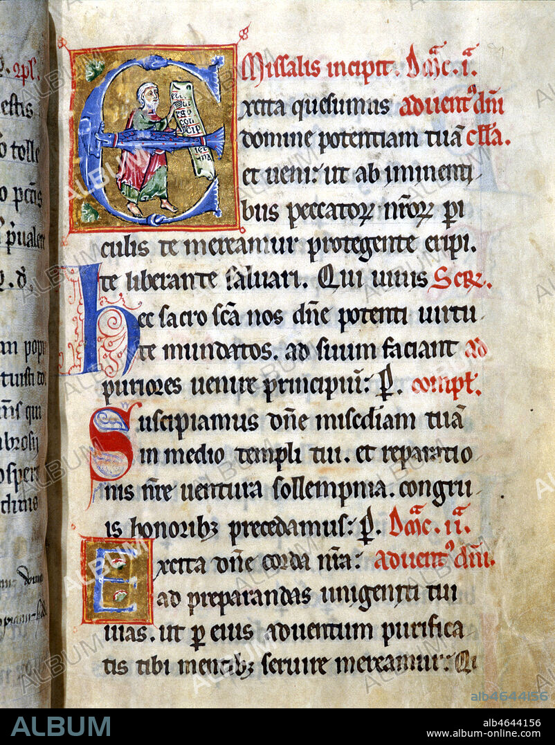 ISAIE ou ESAIE lisant un filactere: prophete biblique de 750 a -700 dans une lettrine E (f°90) formee d'un poisson mordant un dragon. Eluminure du Missale Romanum (Missel romain) du XIIIeme siecle. MENTION OBLIGATOIRE: BMIU-Clermont-Ferrand / photo Grob - Kharbine-Tapabor.
