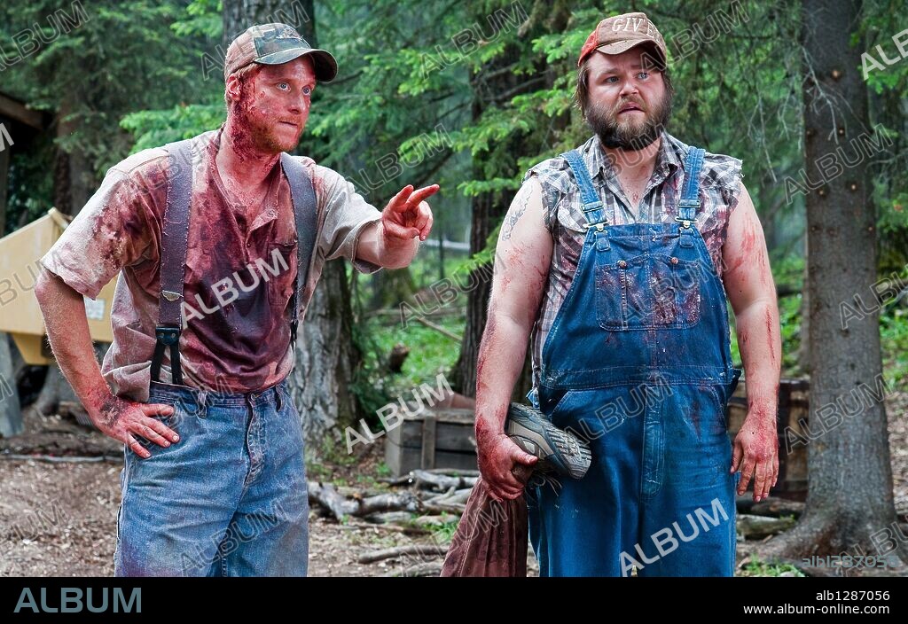 ALAN TUDYK and TYLER LABINE in TUCKER AND DALE VS EVIL, 2010, directed by ELI CRAIG. Copyright EDEN ROCK MEDIA/LOOBY LOU/RELIANCE MOTION PICTU/URBAN ISLAND.