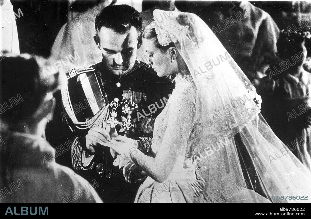 Monaco, 04/19/1956. Wedding between Rainier III of Monaco and Grace Kelly in Monaco Cathedral. In the image, Rainier places the ring on him.