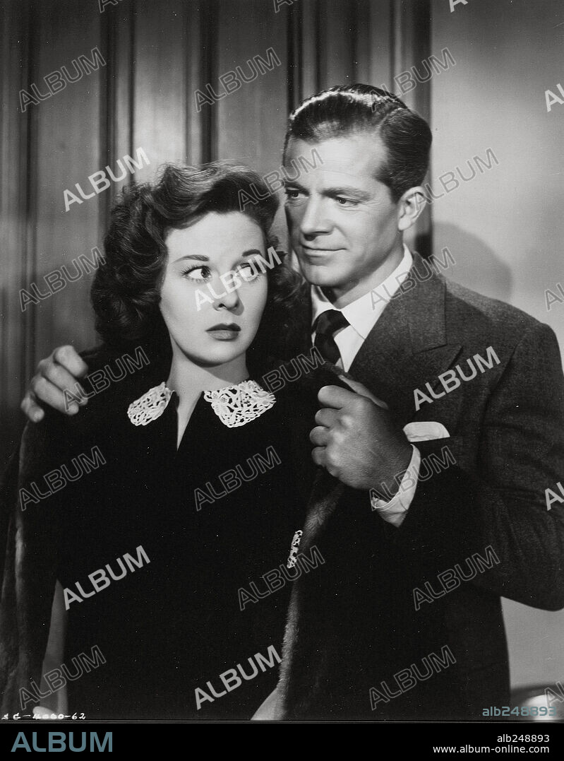 DANA ANDREWS and SUSAN HAYWARD in MY FOOLISH HEART, 1949, directed by MARK ROBSON. Copyright RKO.