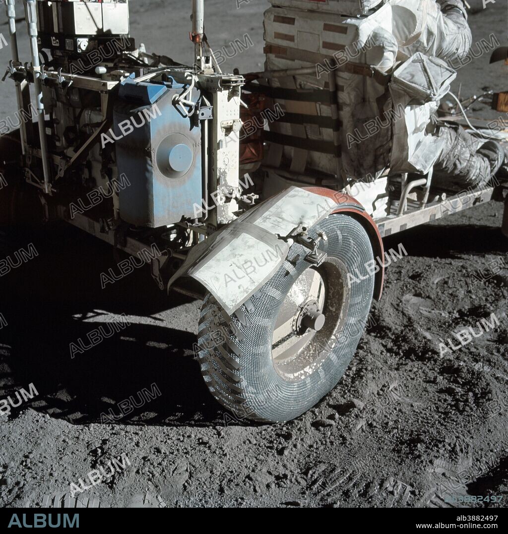 December 12, 1972 - A close-up view of the lunar roving vehicle (LRV) at the Taurus-Littrow landing site during Apollo 17 lunar surface extravehicular activity. Note the makeshift repair arrangement on the right rear fender of the LRV. During EVA, a hammer got underneath the fender and a part of it was knocked off. The crewmen repaired the fender using lunar maps and clamps from the optical alignment telescope lamp.