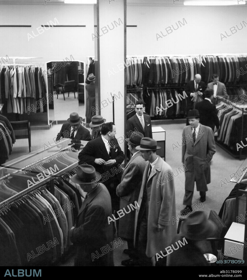 New York, New York:  1955 Men shopping in a men's clothing store.   © Underwood Archives / The Image Works.