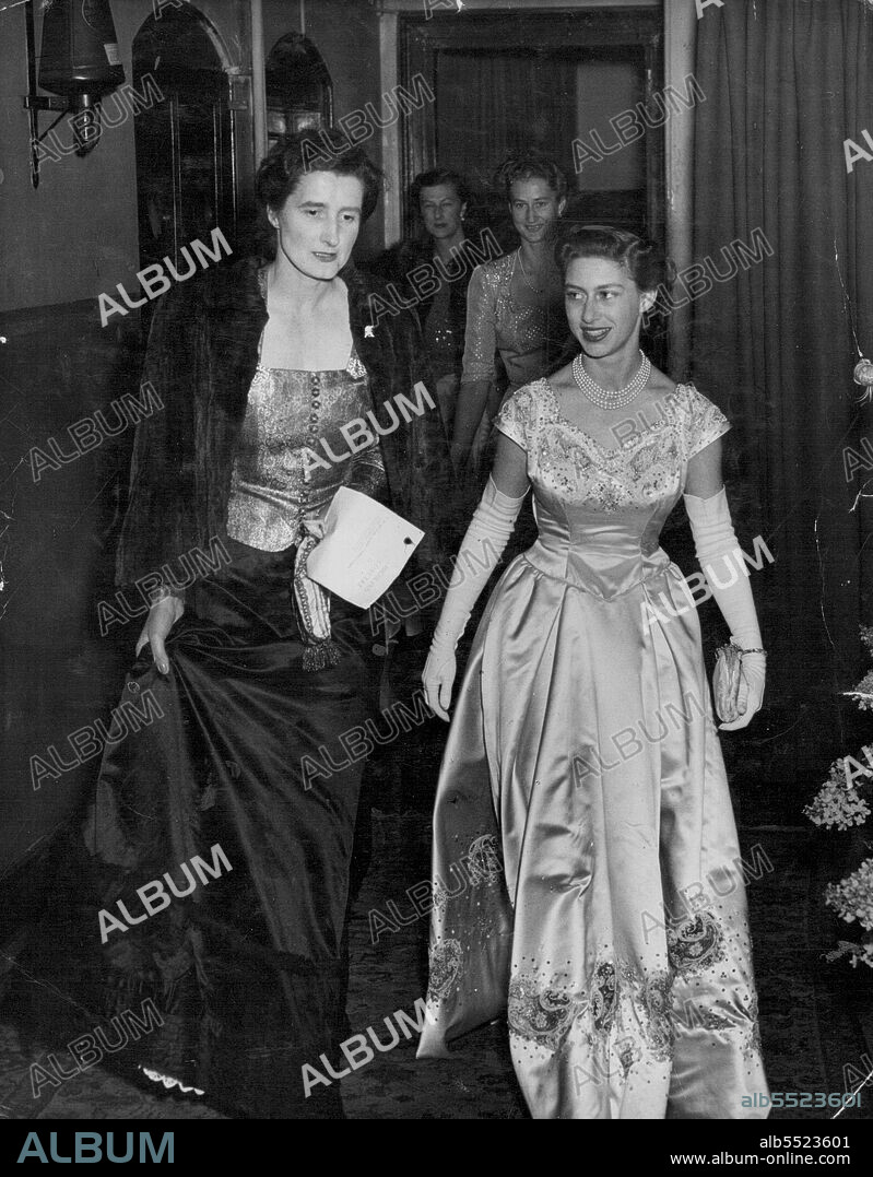 ***** Ambassadress ***** Fashion --Princess Margaret ***** by Mrs. Gordon of Haddo House, ***** The picture shows the elegance of her gown.Princess Margaret ***** the King at the Inauguration of Queen Juliana of the Netherlands, she was also an Ambassadress of Fashion ***** One of her most lovely evening gown of white satin embroidered with sequins and pearls, made especially for this visit, she is seen wearing at the Aberdeen Musica Hall, when ***** attended a concert in aid of the Scottish Childrens League. October 26, 1948.