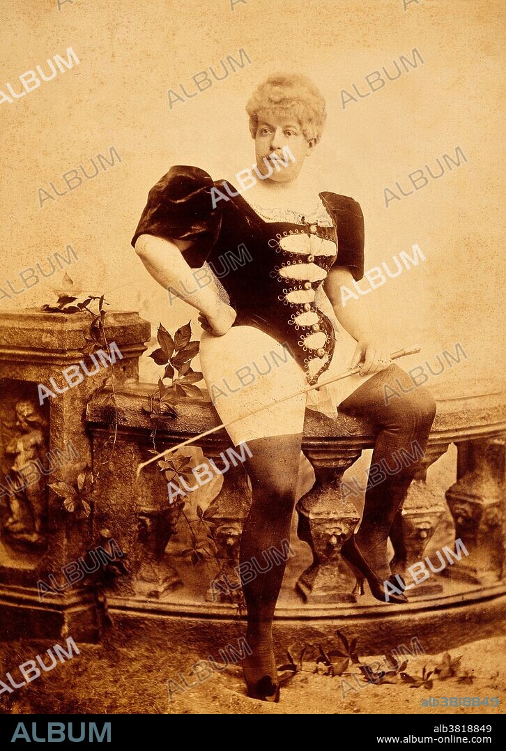 Photograph of a man with a moustache dressed in women's clothing; he is wearing a costume with corset type doublet and hose, and is carrying a whip. Photograph from 1896 by Richard von Krafft-Ebing (1840-1902), an Austro-German psychiatrist and author of the foundational work Psychopathia Sexualis. This book popularized the terms sadism (derived from the brutal sexual practices depicted in the novels of Marquis de Sade) and masochism (derived from the name of Leopold von Sacher-Masoch), although these terms were in use prior to its publication. Psychopathia Sexualis was one of the first books about sexual practices that studied homosexuality/bisexuality.