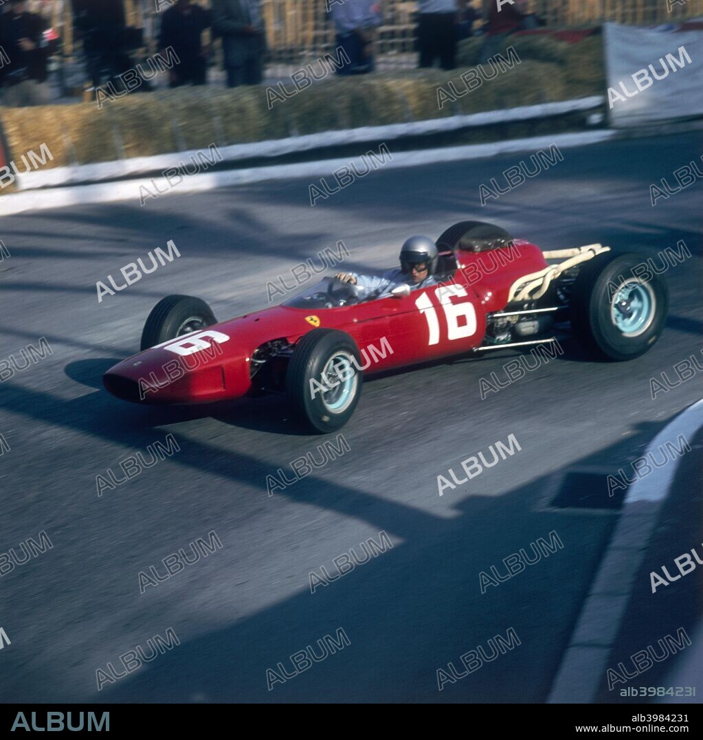 Lorenzo Bandini driving a Ferrari 246, in the Monaco Grand Prix, Monte Carlo, 1966. Taking a bend in the course, Bandini went on to finish second.