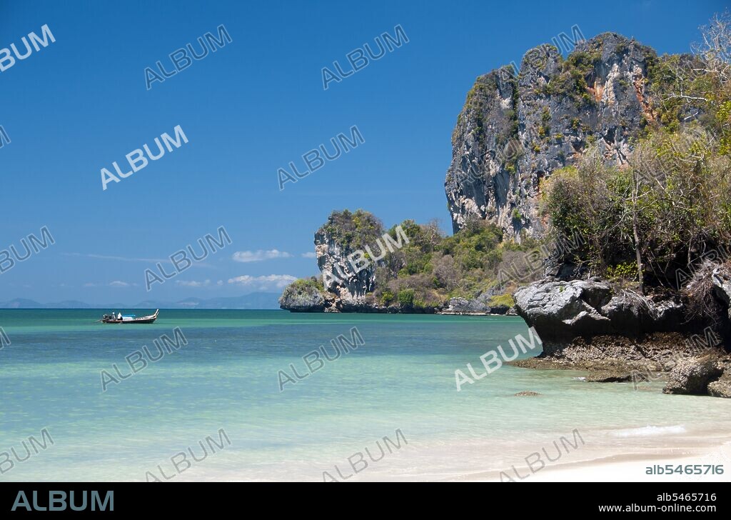 Hat Rai Leh divides into two beaches, East and West. The former, Rai Leh East, is rather muddy at low tide, and people staying here tend to frequent Rai Leh West. Hat Rai Leh West is sandier and generally more attractive. Krabi Province is made up of more than 5,000 sq km of jungle-covered hills and sharp, jagged karst outcrops, as well as more than 100km of luxuriant, pristine coastline and around 200 islands in the neighbouring Andaman Sea. About 40 per cent of the provincial population is Muslim, the remainder being predominantly Buddhist. This is a clear indication that Krabi sits astride the invisible dividing line between Buddhist Thailand and the four southern provinces—Satun, Narathiwat, Yala and Pattani—which are predominantly Muslim. Far from causing any sort of problem, this adds immensely to the cultural width and diversity of the province, blending mosques with temples, Malay cooking traditions with Thai cuisine, and giving the province a pleasantly relaxed multi-cultural feel.