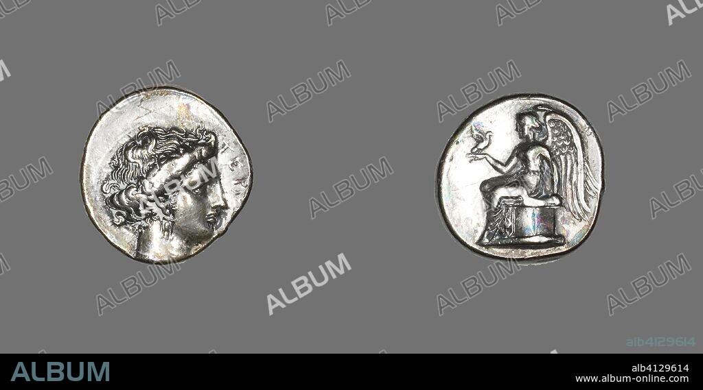 ANCIENT GREEK. Stater (Coin) Depicting the Nymph Terrina. Greek, minted in Terina, Bruttium, Italy. Date: 375 BC-356 BC. Dimensions: Diam. 2.1 cm; 7.60 g. Silver. Origin: Terina.