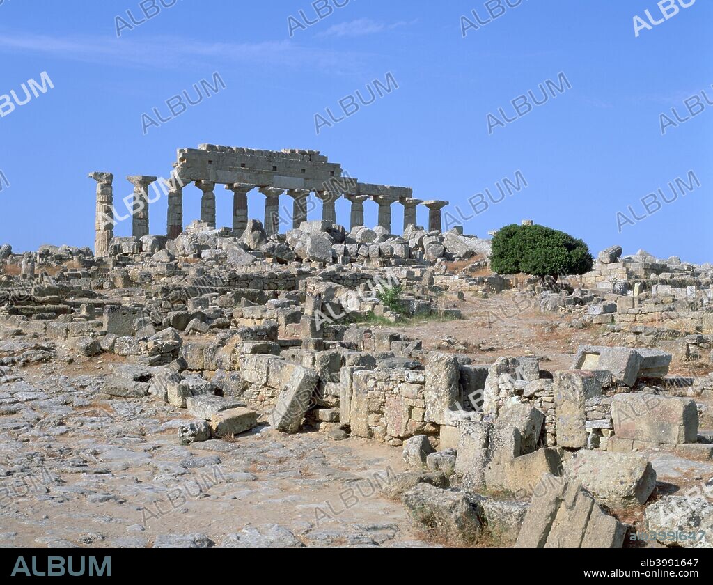 Acropolis, Selinunte, Sicily, Italy. Selinunte was founded by the Ancient Greeks, probably in the 7th century BC, and was one of their most important settlements in Sicily. This view shows the ruins of a temple known as Temple C, which was dedicated to Apollo.