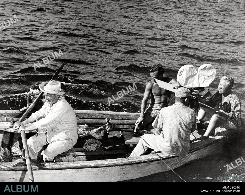JAMES WONG HOWE and SPENCER TRACY in THE OLD MAN AND THE SEA, 1958, directed by JOHN STURGES. Copyright WARNER BROTHERS.