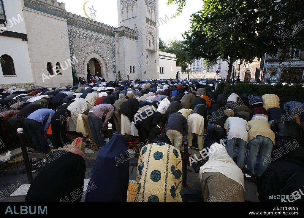 Muslims praying outside the Paris Great Mosque on Eid El-Fitr festival.